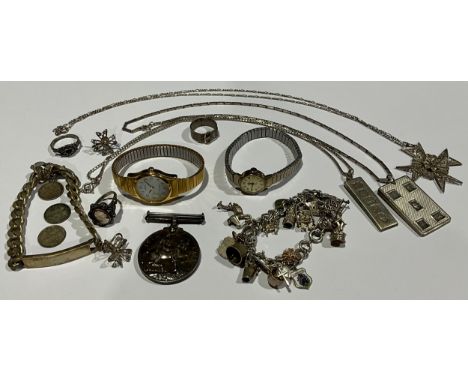 An Elizabeth II silver ingot pendant and chain, Silver Jubilee Year, Birmingham 1977; another similar, 60g gross; a continent