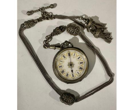 A late 19th century continental lady's silver open face pocket watch, white enamel dial, Roman numerals, the case chased and 