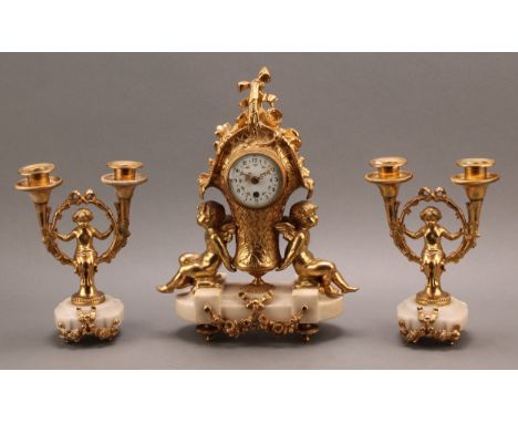 A 19th century French ormolu and white marble time piece mantel garniture, the 6.5cm white enamel dial with Arabic numerals a