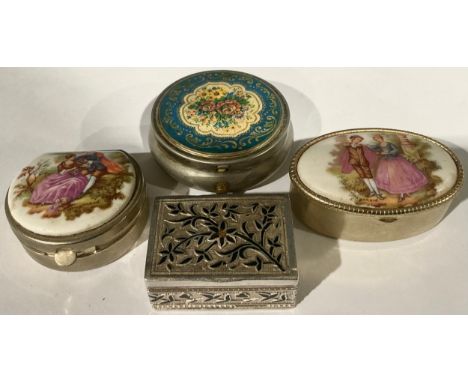 Three patch boxes, the largest 4.5cm in diameter; another similar, a silver and enamel patch box (4)