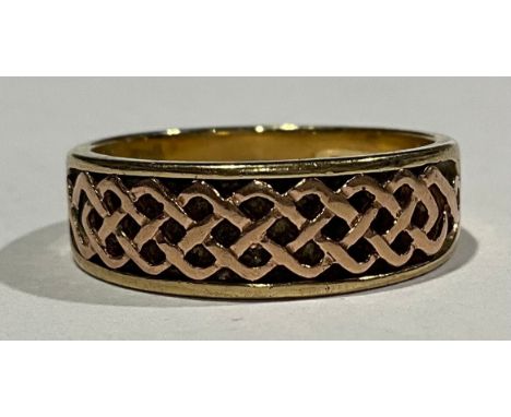 Clogau Celtic Design 9ct yellow and rose gold ring, the ring is hallmarked with the welsh dragon assay mark for welsh gold, t