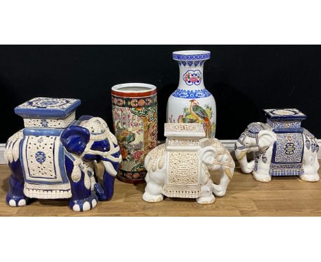 A Chinese pottery garden stool or jardiniere stand, as an elephant, glazed in tones of blue and cream, 43.5cm high; others si