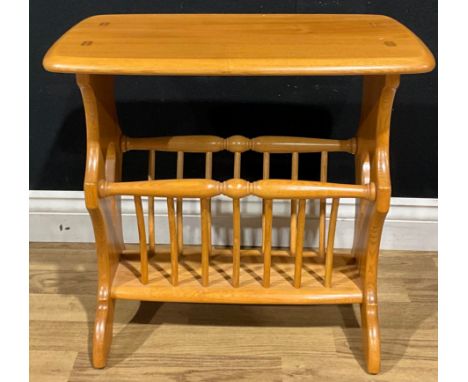 An Ercol Chaucer magazine rack, 52cm high, 54.5cm wide, 36cm deep