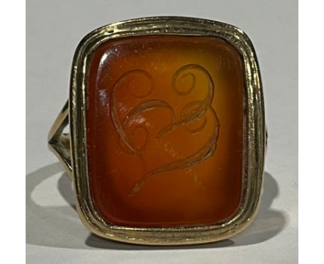 Antique Tested 9ct Gold Intaglio Initialled Signet Ring, the ring has a rectangular shaped with round corners piece of polish