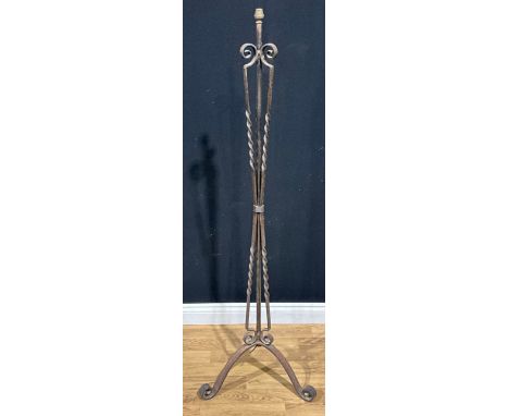 An Arts and Crafts style wrought iron floor lamp