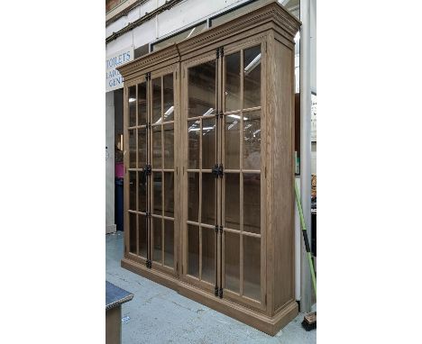 GLAZED BOOKCASE, double fronted design with vintage style black metal locking mechanism, 230cm W x 45cm D x 261cm H approx. 