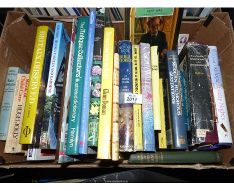 A box of books to include: The Encyclopedia of Witchcraft and Demonology, Halt A While In Britain, The Diaries of Auberon Wau