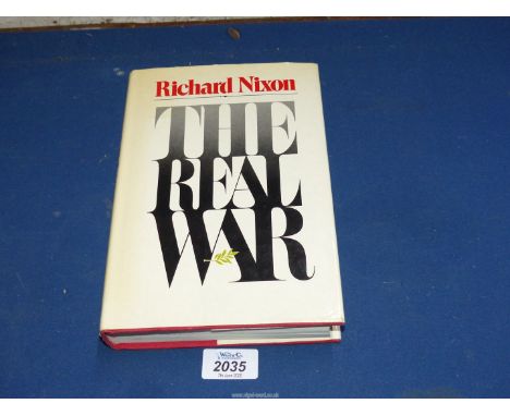 A 1980 copy of the hardback book titled ''The Real War'' by Richard Nixon published by Sidgwick and Jackson Ltd., inscribed b