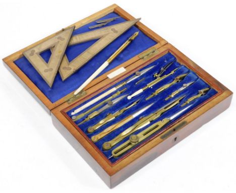 A late Victorian rosewood cased technical drawing or geometry set, containing finely engineered brass and steel implements in