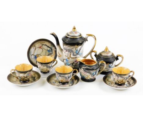 A 20thC Japanese Fairylite coffee service, comprising coffee pot, 19cm high, two handled sugar bowl, milk jug, four cups and 