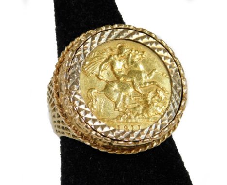 An Edwardian gold half sovereign 1911, in basket weave ring setting, size R, 12g all in.