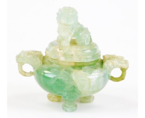 A Chinese green quartz tripod incense burner and cover, with decorative dog of fo finial, shaped animal mask handles, 14cm hi