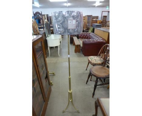 A brass standard lamp