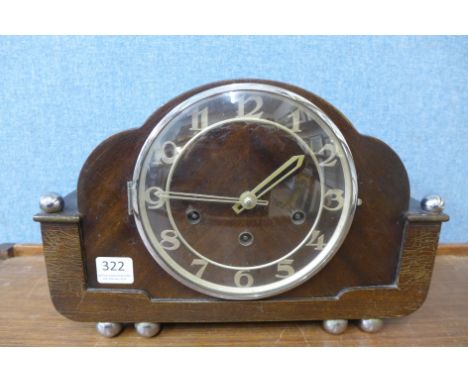An Art Deco mahogany mantel clock