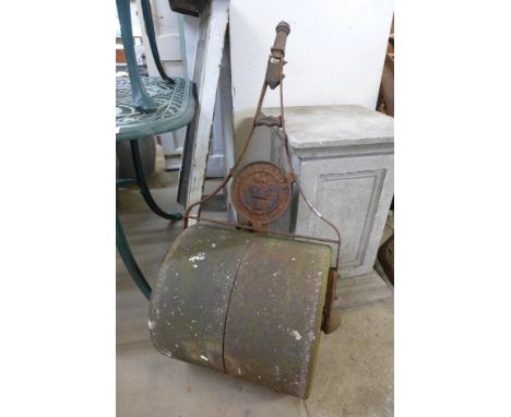 A vintage garden lawn roller, a/f