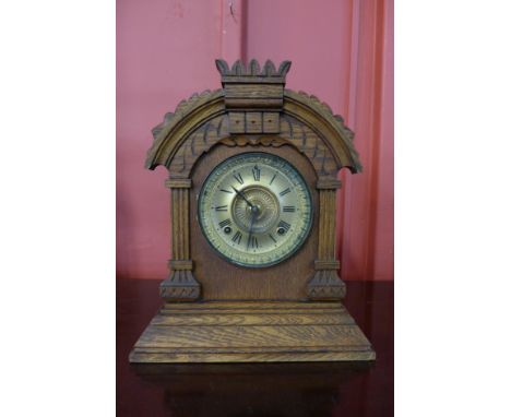 A 19th Century American Ansonia Tunis oak mantel clock
