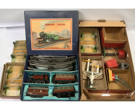 Hornby O Gauge post-war set Rolling Stock and Accessories a quantity consisting of a No.101 Tank Passenger Set with an 0-4-0 