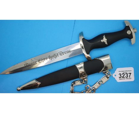 German SS reproduction dagger with etched blade and chained scabbard. P&amp;P Group 2 (£18+VAT for the first lot and £3+VAT f