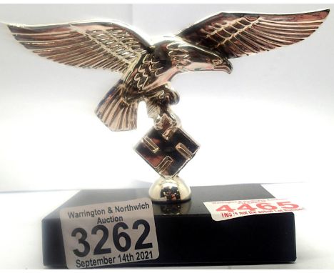 A modern chromed Luftwaffe eagle desk ornament on a marble plinth. P&amp;P Group 2 (£18+VAT for the first lot and £3+VAT for 