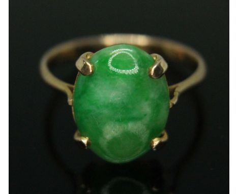 A jadeite jade cabochon ring, marked '9c', gross wt. 2.4g, size O.  