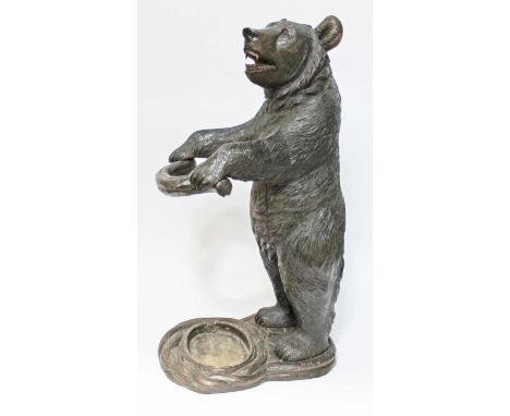 A carved Black Forest bear stick and umbrella stand, circa 1900, height 78cm.&nbsp;Condition - age related crack to belly/che