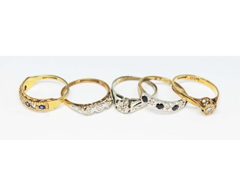 Four hallmarked 9ct gold rings and another marked '18ctPLAT', gross wt. 9.1g, sizes K/L.  