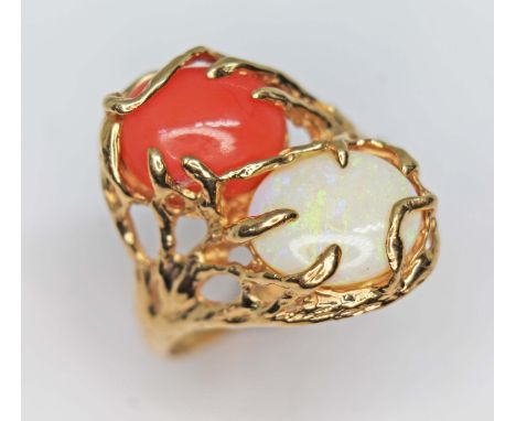 A precious opal and coral cabochon ring, each held within a naturalistically formed setting, cluster length approx. 23mm, mar