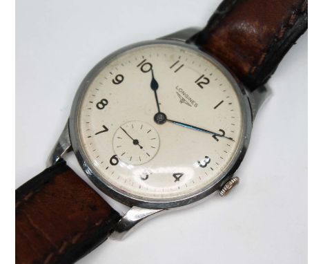 An oversized Longines, circa 1947, ref. 23490, cal. 12.68Z (unmarked), stainless steel case, diam. 37mm, signed champagne dia