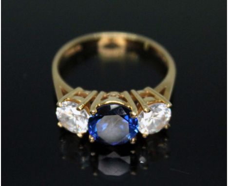 A hallmarked 14ct gold blue and white CZ ring, gross wt. 4.7g, size R.  