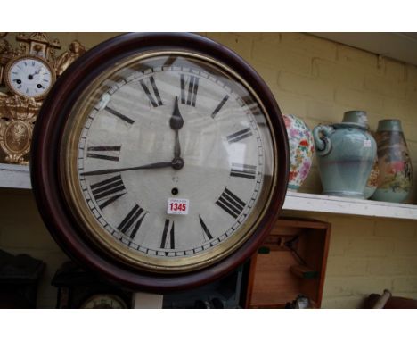 An old stained mahogany framed circular wall clock, 40cm diameter. 