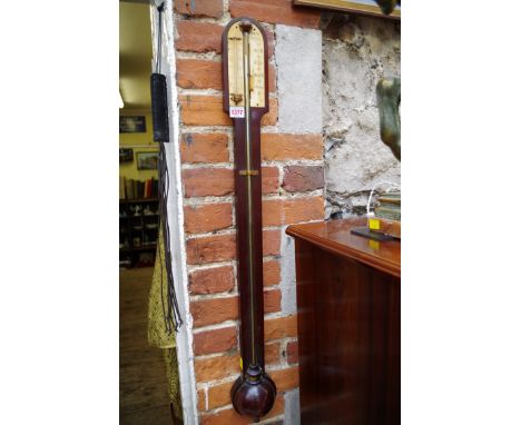 A 19th century mahogany stick barometer, the ivory dial inscribed 'West, London'.   Condition Report:  There is splits/cracks