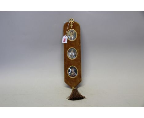 Three portrait miniatures, set in single tasselled mount.