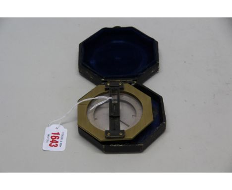 A Victorian brass octagonal surveyor's compass, by Cail, Newcastle Upon Tyne, 9.3cm wide, in fitted leather case.
