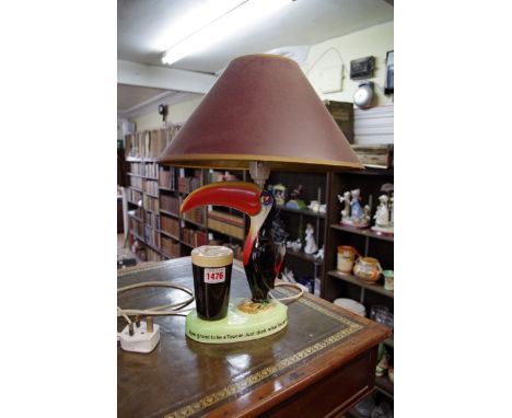 A Carltonware Guinness Toucan lamp, height excluding fitting 23cm, (repaired).