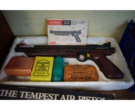 A Crossman Model 1322 Medalist .22 air pistol, boxed and with manual.  