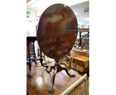 A George III mahogany circular tilt-top tripod table, 75cm wide. 