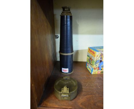 A reproduction three drawer telescope; and a reproduction military style compass. 