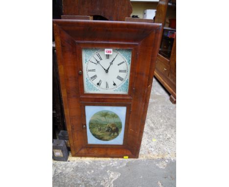 A circa 1890s American mahogany 8 day wall clock, by Waterbury, 76cm high.  