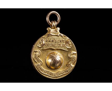 1928 SCOTTISH LEAGUE CHAMPIONSHIP WINNERS GOLD MEDAL, the obverse with central football motif in high relief, inscribed 'Rang