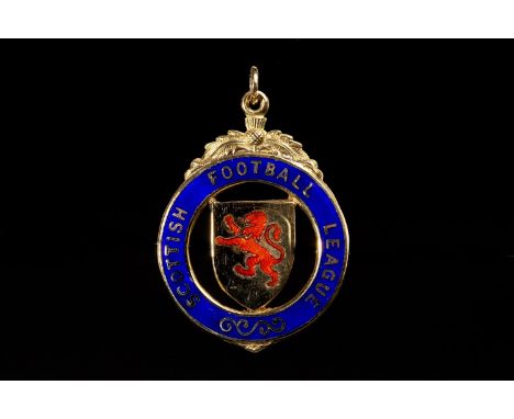 1988 SCOTTISH FOOTBALL LEAGUE SKOL CUP RUNNERS UP MEDAL, the obverse with central shield shaped plaque with red enamel lion r