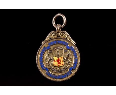 1934 BENBURB F.C. SCOTTISH JUNIOR FOOTBALL ASSOCIATION WINNERS MEDAL, the obverse with 'Scottish Junior Football Association'