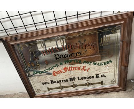 An advertising mirror for "John Rogers, Pewterers, beer engine &amp; pewter pot makers..."