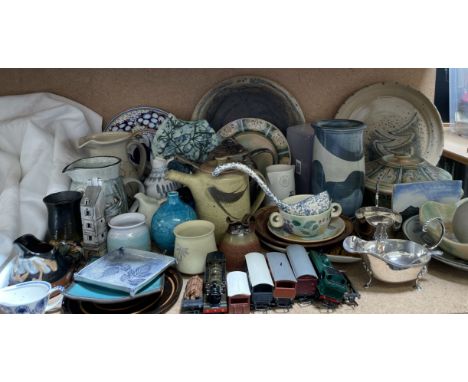 A Poole pottery dish together with assorted studio pottery, electroplated sauce boats, trains etc