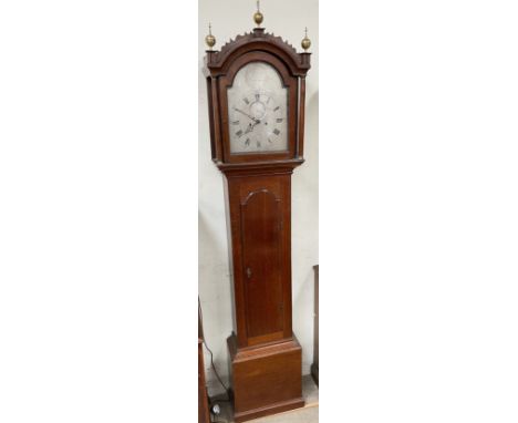 A 19th century oak longcase clock, with an arched hood and ionic columns and a long trunk door, box base and plinth, the 30cm