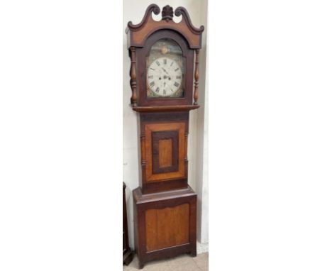 A 19th century mahogany longcase clock, the hood with a central fan spandrel and broken swan neck pediment and turned columns