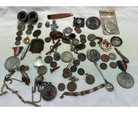 A pair of silver candlestick sconces together with coins, commemorative medals, etc