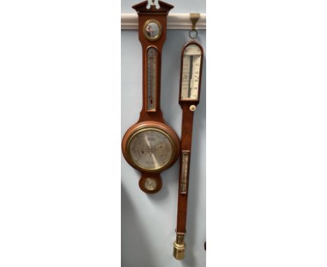 A 19th century mahogany stick barometer, with a mercury thermometer together with a Comitti of London aneroid barometer