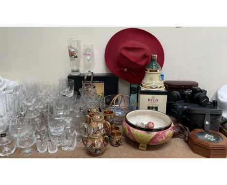 Assorted drinking glasses together with a Japanese part tea set, Wedgwood salad bowl and servers, Bells whisky decanter, bino