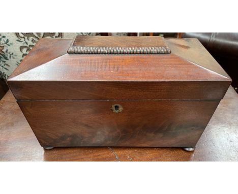 A Victorian mahogany sarcophagus shaped tea caddy