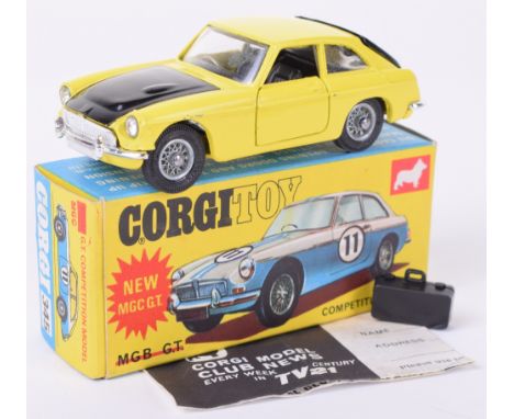 Corgi Toys 345 MGC GT Competition Model, yellow body/black bonnet/tailgate, black interior, spoked wheels, suitcase, in very 